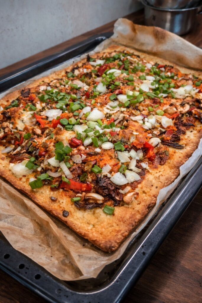 Pizza z szarpanym kurczakiem i orzechami nerkowca